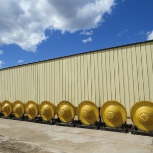 ten yellow wheel groups in line