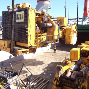Global relocation project of Komatsu 830E, truck body being unloaded from cargo ship
