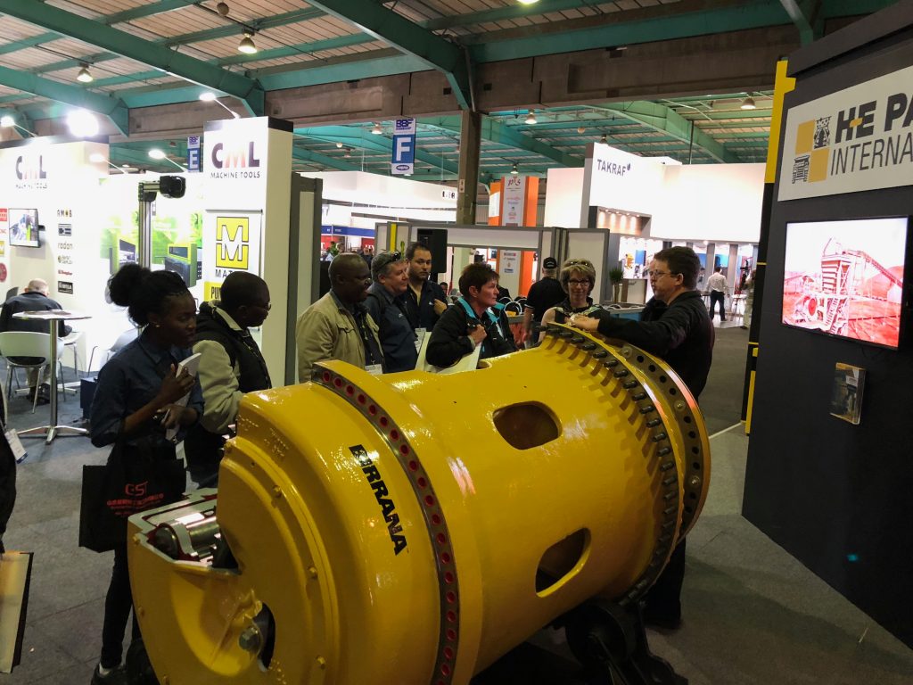H-E Parts global engineering manager explaining Birrana enhancements to guests at Electra Mining 2018