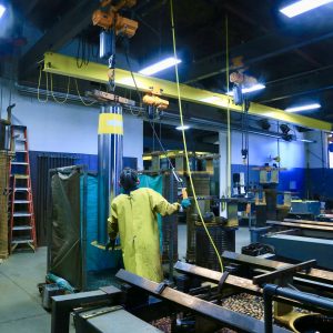 Billings MT, Cyliner Shop Employee working on shaft repair
